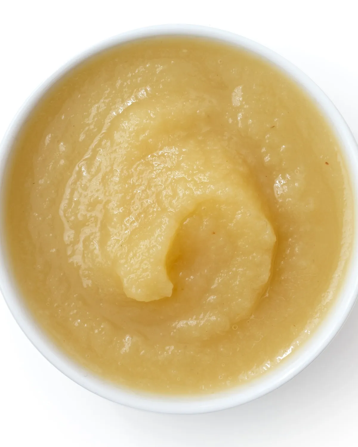 Bowl of smooth fruit puree seen from above