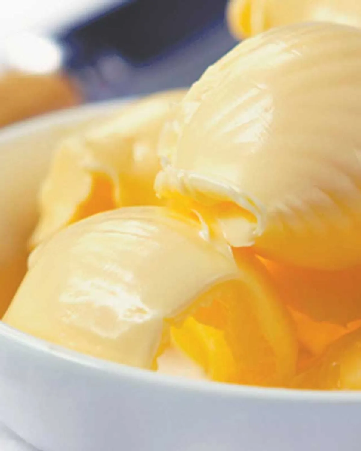 Bowl of margarine with a rolling pin