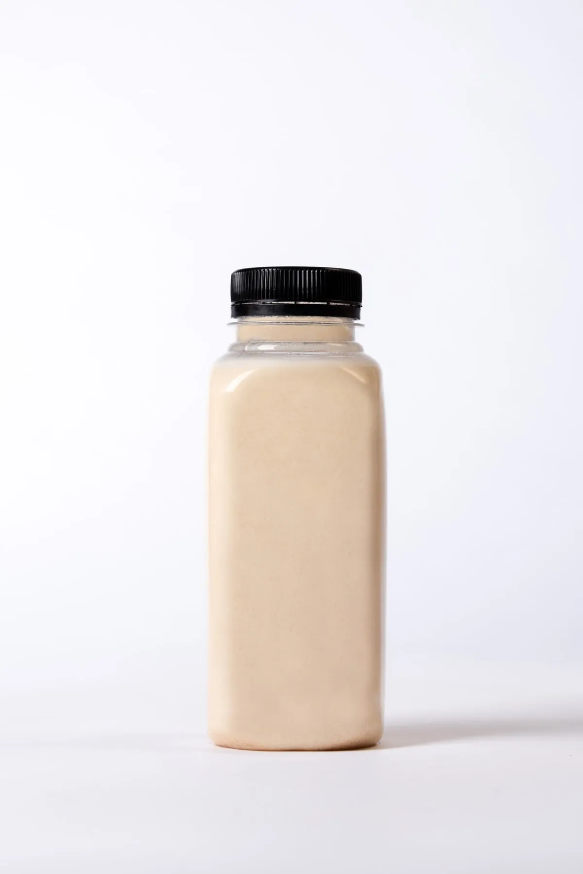 A bottled meal replacement shake against a plain background